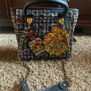 Mini handbag purse. Chanel like. I stamped it. Has pearls on one side. Like new.